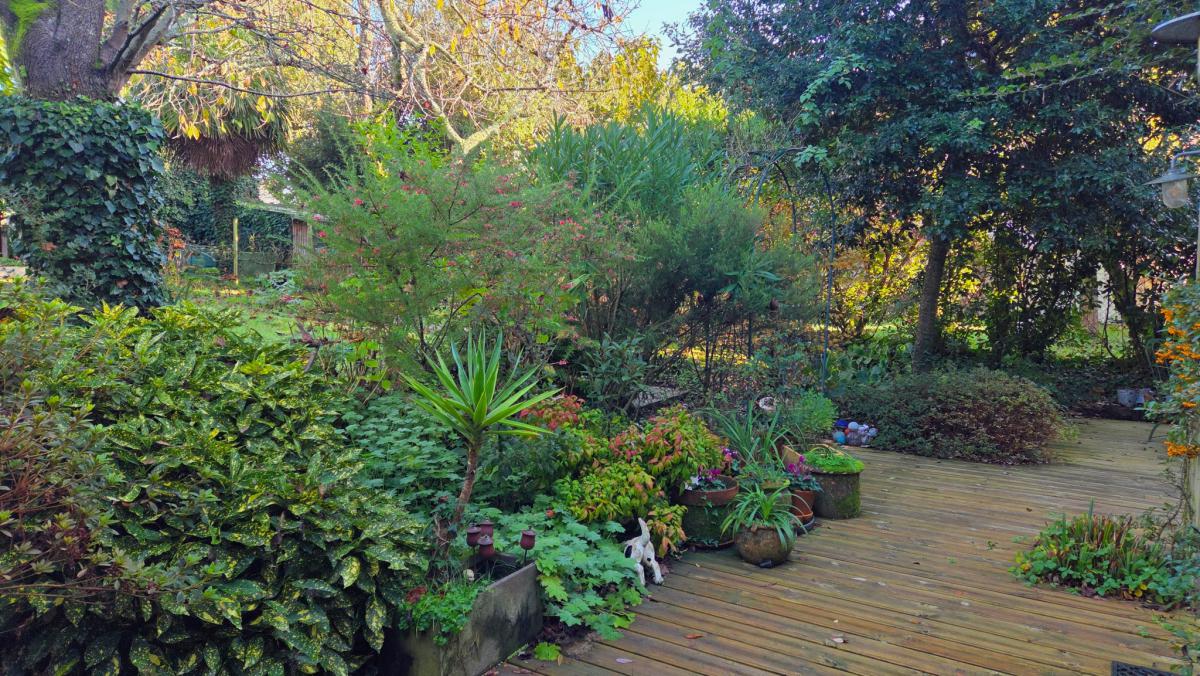 Renovated 4-bedroom house with garden, garage, and outbuildings