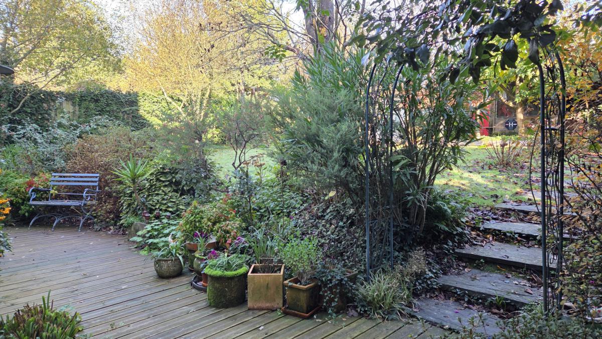 Renovated 4-bedroom house with garden, garage, and outbuildings