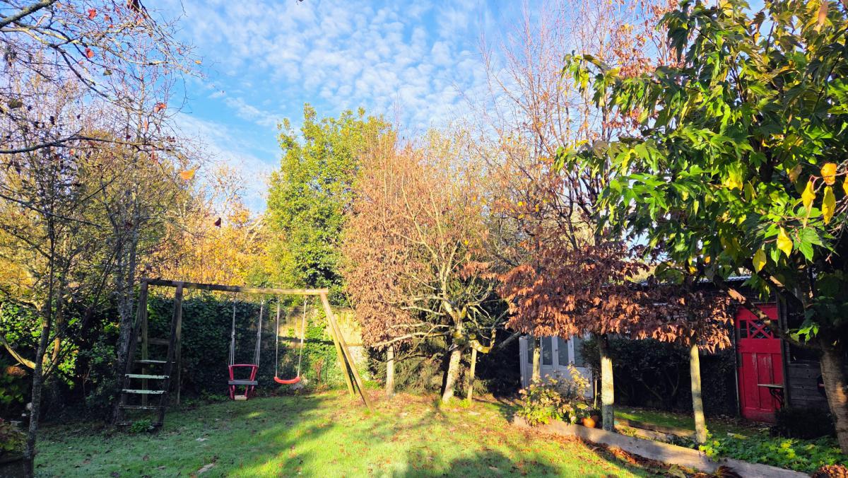 Renovated 4-bedroom house with garden, garage, and outbuildings