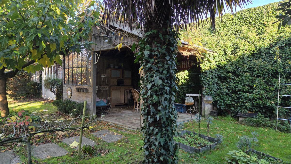 Renovated 4-bedroom house with garden, garage, and outbuildings