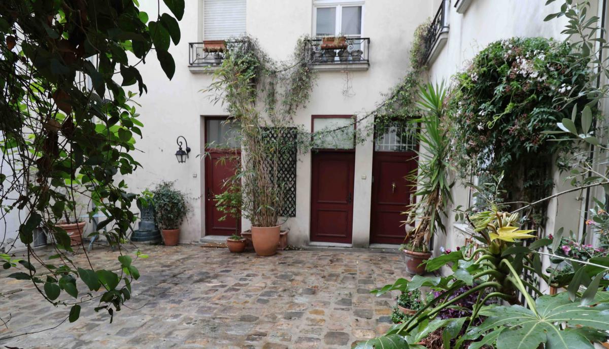 Appartement rénové duplex 2 ch parquet double exposition