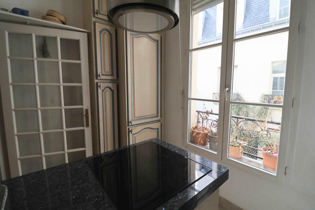 Appartement rénové duplex 2 ch parquet double exposition