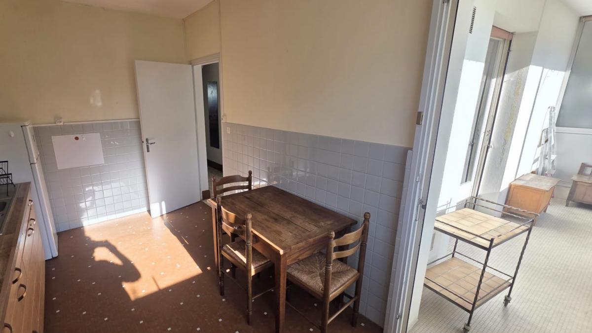 Appartement traversant balcon-terrasse loggia + cave