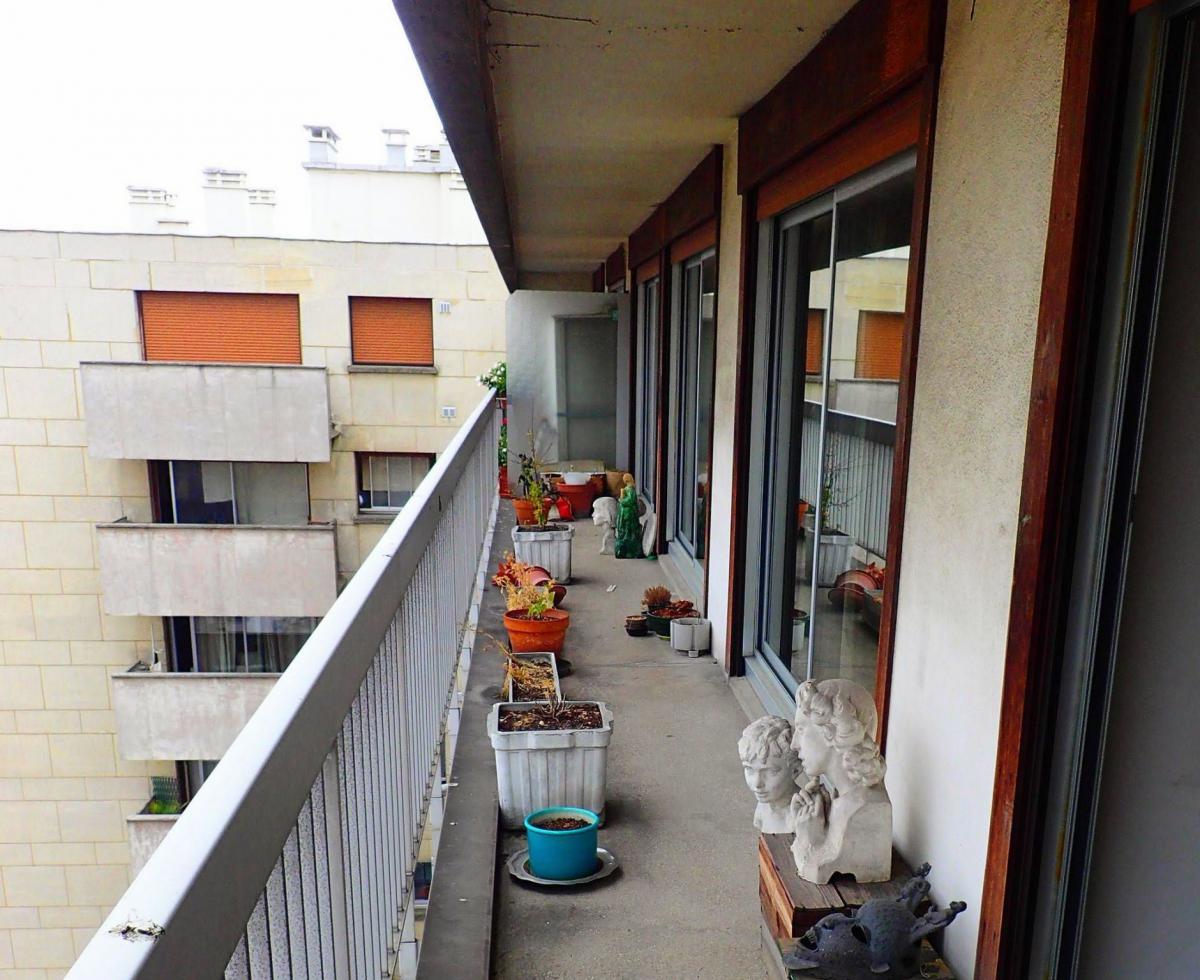 Appartement traversant 133m2 dernier étage balcon 4 chambre