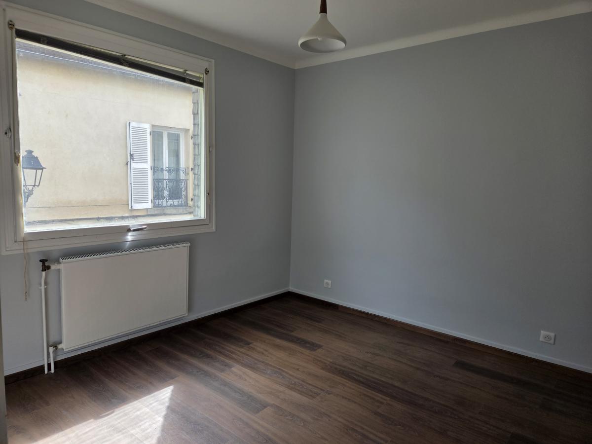 Centre-ville appartement ancien lumineux 2 ch cave