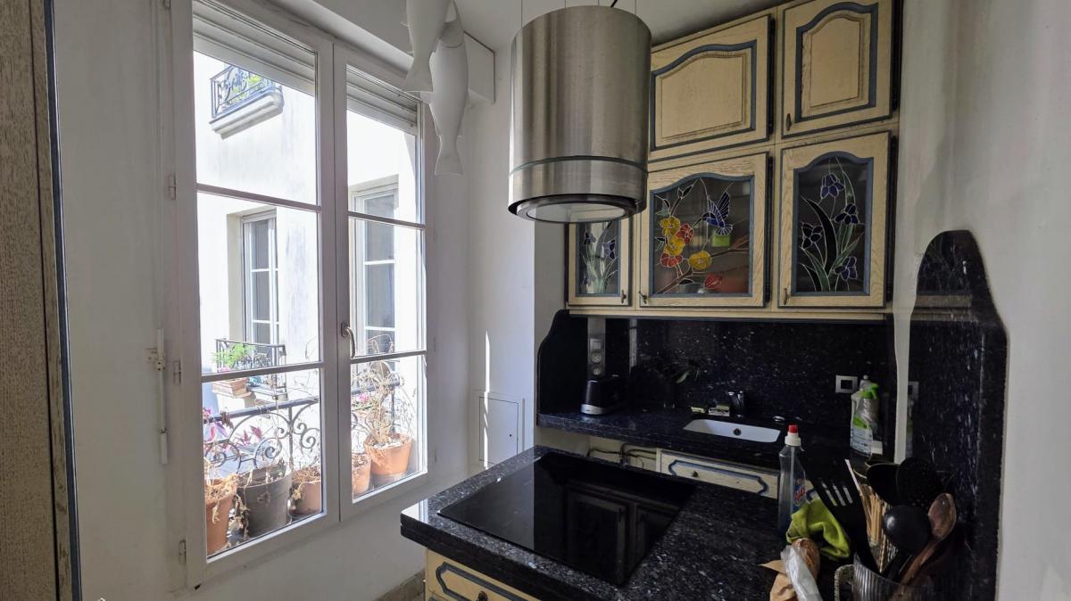 Appartement rénové duplex 2 ch parquet double exposition